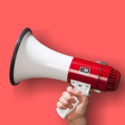 megaphone on red background